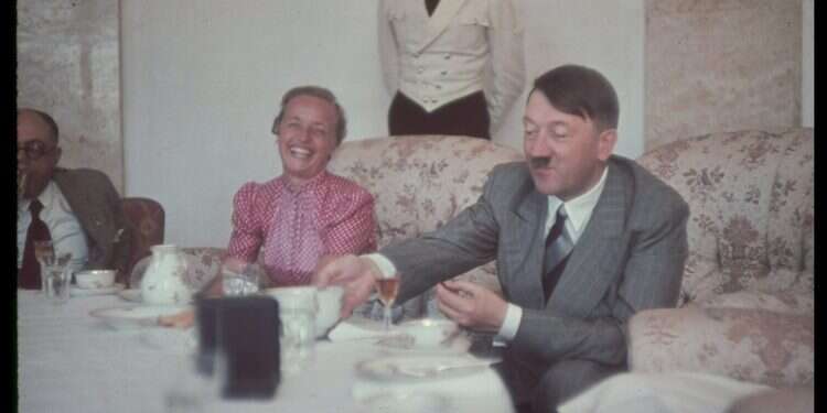 Adolf Hitler (1889 - 1945) (right) eats a meal with his personal physician, Professor Theodor Morell (1886 - 1948) (left), and the wife of Gauleiter Albert Forster, at the Berghof Explosive find shatters Hitler's 90-year alibi in familial death