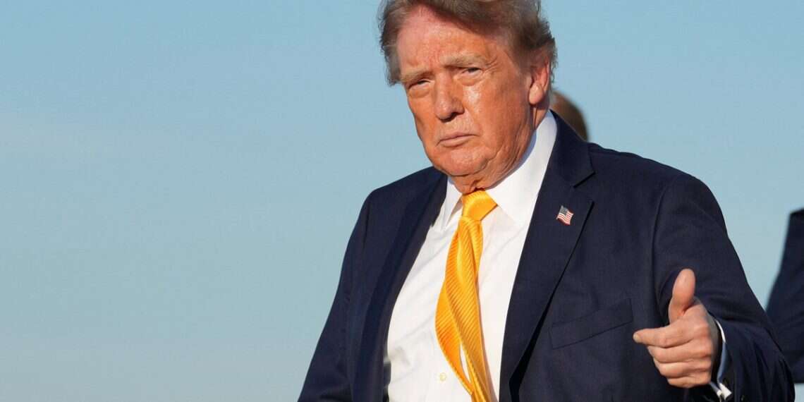 US President Donald Trump gives a thumbs up after exiting Air Force One at Morristown Municipal Airport, in Morristown, New Jersey, US, September 4, 2026 Trump's hair turns heads after surprise color change