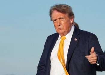 US President Donald Trump gives a thumbs up after exiting Air Force One at Morristown Municipal Airport, in Morristown, New Jersey, US, September 4, 2026 Trump's hair turns heads after surprise color change