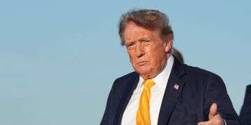 US President Donald Trump gives a thumbs up after exiting Air Force One at Morristown Municipal Airport, in Morristown, New Jersey, US, September 4, 2026 Trump's hair turns heads after surprise color change