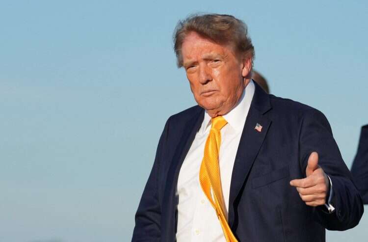 US President Donald Trump gives a thumbs up after exiting Air Force One at Morristown Municipal Airport, in Morristown, New Jersey, US, September 4, 2026