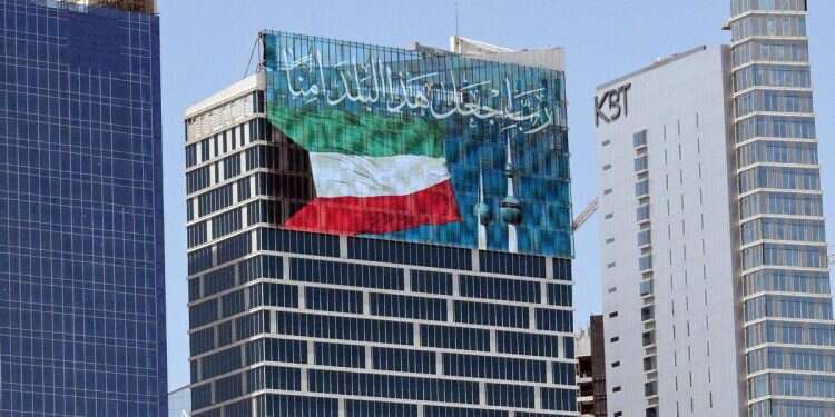 A large screen displays a verse from the Koran reading 'My Lord, make this city secure,' alongside the Kuwaiti flag in City on September 2, 2026 Kuwait quietly moves toward Israel amid Iran threat