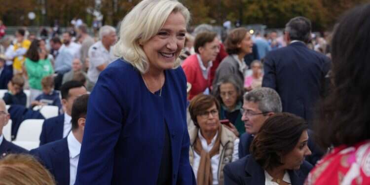 French Far-right leader Marine Le Pen arrives to attend a mass celebrated by Pope Leo XIV at Place de la Concorde, Paris, Saturday, Sept. 26, 2026 France's National Rally makes record gains in Senate elections