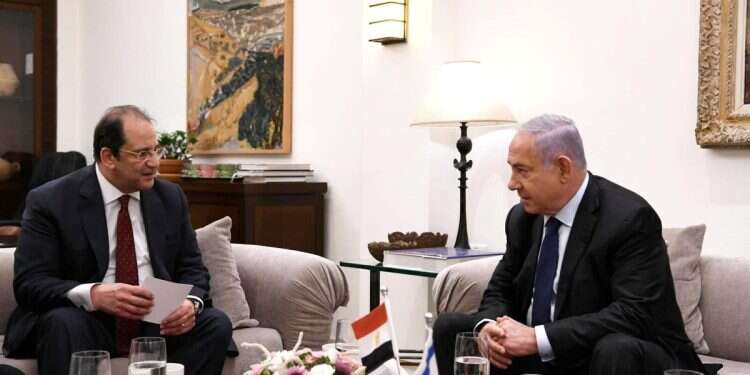 Prime Minister Benjamin Netanyahu meets Director of the Egyptian General Intelligence Directorate, Abbas Kamel (L) in West Jerusalem on May 30, 2021. Egypt warned Netanyahu days before Oct 7 attack; Prime Minister's Office denies claim