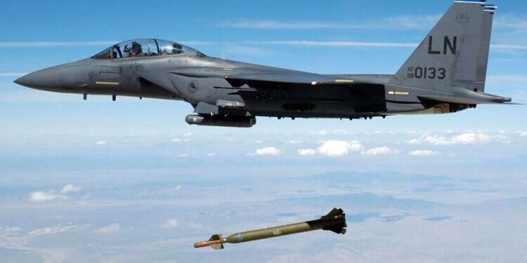 A US Air Force F-15E Strike Eagle aircraft releases a GBU-28 'Bunker Buster' 5,000-pound Laser-Guided Bomb during a weapons evaluation test hosted by the 86th Fighter Weapons Squadron (FWS) from Eglin Air ForceBase, Florida, in this August 5, 2003 US evaluates advanced bunker-busting capabilities as secret Iranian nuclear fortress expands