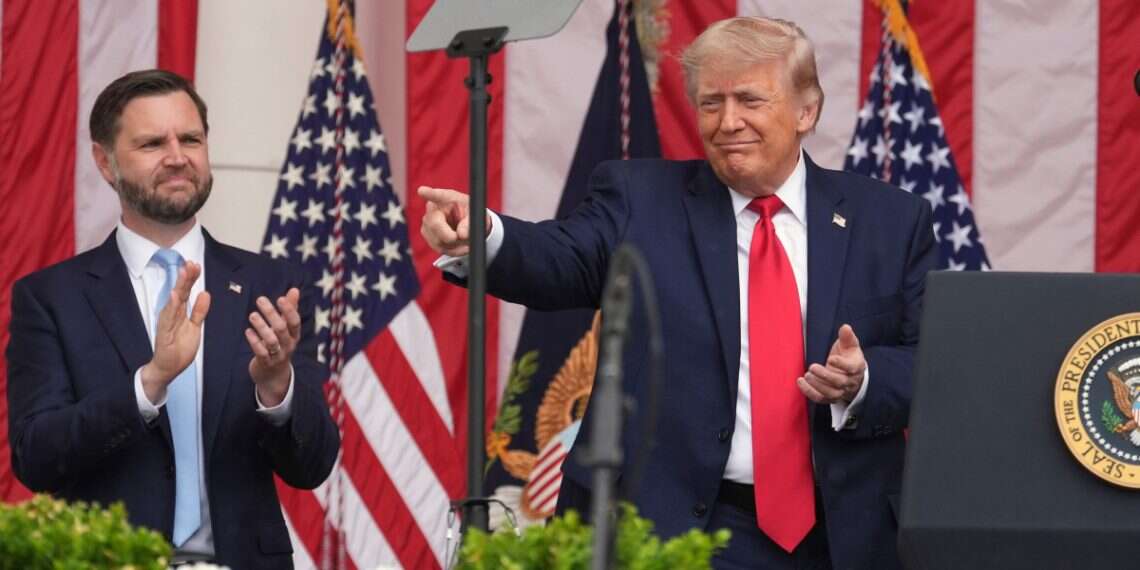 President Donald Trump points as Vice President JD Vance watches during the 158th National Memorial Day Observance coinciding with the nation's 250th anniversary, at the Memorial Amphitheater in Arlington National Cemetery, Monday, May 25, 2026. Report: Vance secretly tried to help Clinton defeat Trump in 2016