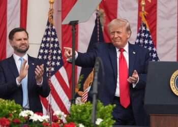 President Donald Trump points as Vice President JD Vance watches during the 158th National Memorial Day Observance coinciding with the nation's 250th anniversary, at the Memorial Amphitheater in Arlington National Cemetery, Monday, May 25, 2026. Report: Vance secretly tried to help Clinton defeat Trump in 2016