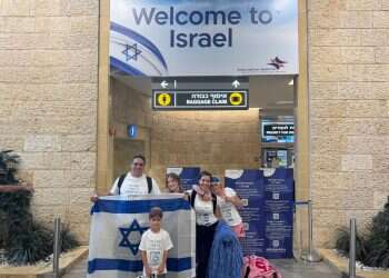 Yael, Daniel and their three children on the day they made aliyah. Photo: Courtesy of the family 'We're not visiting, this time we're home'