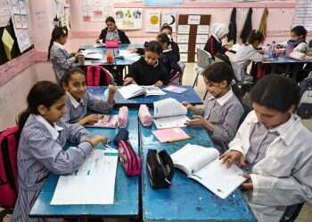 Palestinian children attend class at a United Nations Relief and Works Agency for Palestine Refugees (UNRWA) run school in the Qalandia refugee camp in the occupied West Bank on November 14, 2024 UNRWA teacher says she was silenced after challenging anti-Jewish lessons