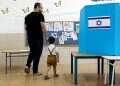 A father and son enter a polling station during the previous election. Photo: Reuters A letter to my son as he steps behind the voting booth