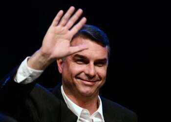 Brazil's right-wing presidential candidate and Senator Flavio Bolsonaro waves during a press conference in Brasilia on August 5, 2026 Flávio Bolsonaro declares himself Brazil's 'true president' after election loss