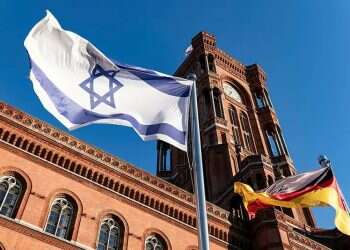 Israeli and German flags in Berlin. Photo: AFP 'We will continue using every means available to protect Jews and Israelis in Berlin'