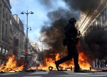 French PM declares partial curfew as riots sweep the country