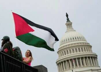A pro-Palestinian protester with the US Capitol in the background | Photo: Reuters Israel faces a political tsunami in Washington